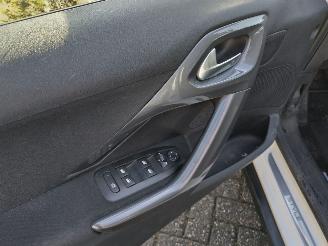 Peugeot 2008 1.2 Style Panodak Ac Cruise Mooie auto weing schade! picture 10