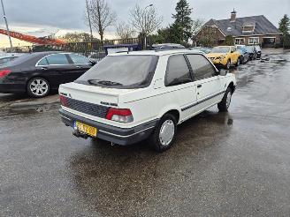 skadebil auto Peugeot 309 1.4 1992/7