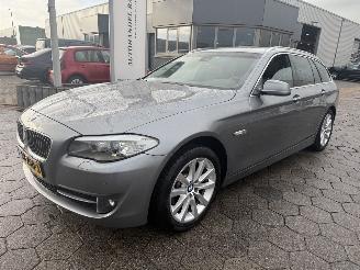 Schadeauto BMW 5-serie Touring 520d High Executive 2011/12