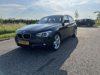 uszkodzony samochody osobowe BMW 1-serie 114i EDE High Executive 2014/5