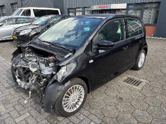 Schadeauto Volkswagen Up!  2014/3