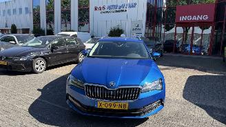 damaged passenger cars Skoda Superb COMBI 15 TSI BUSS ED 2024/1