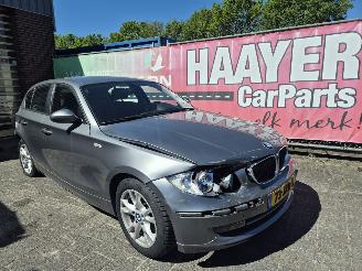 Damaged car BMW 1-serie 118I  business line 2009/9