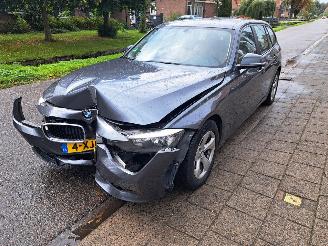 Schadeauto BMW 3-serie 316i touring automaat 2014/8
