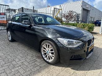 damaged passenger cars BMW 1-serie 116d Automaat Executive 2014/5