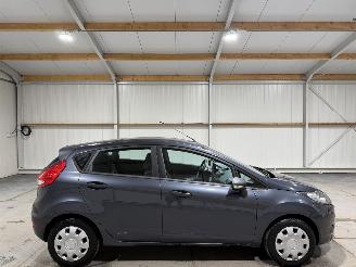skadebil auto Ford Fiesta 1.25 44kW Limited Airco 2009/11