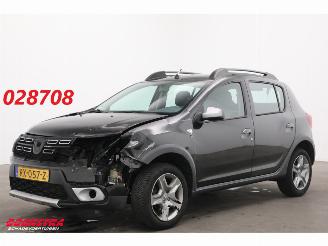 Vaurioauto  passenger cars Dacia Sandero 0.9 TCe SL Stepway Navi Airco Cruise PDC AHK 2018/2