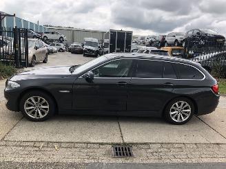 Damaged car BMW 5-serie 520i Touring Aut High Executive 2012/1