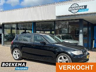 Damaged car BMW 1-serie 116i Business Line Cruise Climate Trekhaak 2009/10