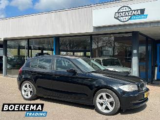 Vaurioauto  passenger cars BMW 1-serie 116i Business Line Cruise Climate Trekhaak 2009/10
