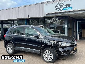 damaged passenger cars Volkswagen Tiguan 1.4 TSI R-Line DSG Dynaudio Stoelverwarming Climate Cruise 2014/1