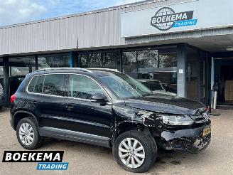 Schadeauto Volkswagen Tiguan 1.4 TSI R-Line DSG Dynaudio Stoelverwarming Climate Cruise 2014/1