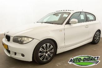 Damaged car BMW 1-serie 116i Airco Elek Dak 2009/12