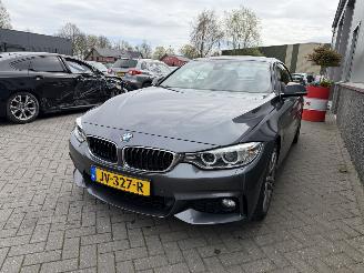 Vaurioauto  passenger cars BMW 4-serie 420i Centennial High Executive Cabrio 2016/6