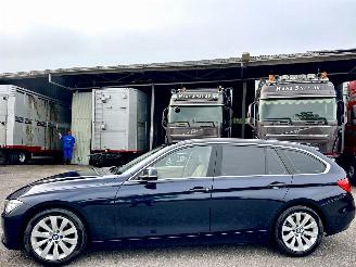 damaged passenger cars BMW 3-serie 320i 184pk 8-traps aut High Executive - nap - xenon - beige leer - stoelverw - navi - pdc - elektr klep 2014/1