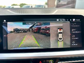 BMW 3-serie Gereserveerd 320d 190pk aut + f1 xDrive High Exe sedan - schuifdak - harman/k - head up - keyless - 360cam - stuurverw picture 25