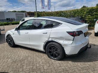 Tesla  Tesla MODEL Y RWD 58 kWh range 455km nwprijs € 45000 picture 4