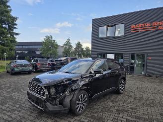 Schadeauto Toyota Corolla Cross 2.0 LTr -112kw / PANO / LEER / JBL AUDIO 2024/11
