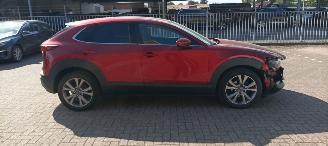 Auto incidentate Mazda CX-30 Bj 8-2019 1.8 Climatecontrol Leder Navi Led-Koplampen Led-Achterlichten Stoelverwarming Lichtautomaat Privacyglas keyless Entry Bose Soundsystem elektrische achterklep 2019/8