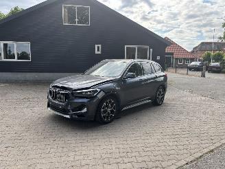 damaged passenger cars BMW X1 PLUG IN HYBRIDE AUTOMAAT PANORAMADAK LEER NAVI CLIMA B.J 2020 2020/4
